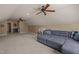 Finished attic featuring carpeted floors and a plush gray couch at 120 Teasel Ct, Clayton, NC 27527