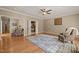 Spacious living room with hardwood floors and seamless transition to other living spaces at 120 Teasel Ct, Clayton, NC 27527