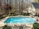 In-ground pool with lounge chairs and landscaping at 120 Teasel Ct, Clayton, NC 27527