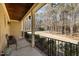 Covered front porch with wooded view at 120 Teasel Ct, Clayton, NC 27527