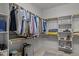 Walk-in closet with ample clothing storage and built-in shelving at 120 Teasel Ct, Clayton, NC 27527