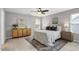 Serene bedroom with a plush bed and stylish decor at 127 S Harrison Place Ln, Fuquay Varina, NC 27526