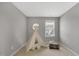 Cozy bedroom with natural light and neutral decor at 127 S Harrison Place Ln, Fuquay Varina, NC 27526