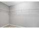 Spacious walk-in closet with multiple shelves for storage at 127 S Harrison Place Ln, Fuquay Varina, NC 27526