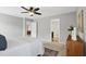 A beautiful main bedroom with carpet and a fan at 127 S Harrison Place Ln, Fuquay Varina, NC 27526