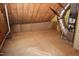 View of unfinished attic, showing wood beams and HVAC system at 1309 Wakefield Farm Rd, Zebulon, NC 27597