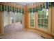 Breakfast nook with a view of the backyard deck at 1309 Wakefield Farm Rd, Zebulon, NC 27597