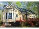 Home exterior showcasing a spacious wooden deck with double doors leading to the interior at 1309 Wakefield Farm Rd, Zebulon, NC 27597