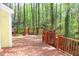 Spacious wooden deck with scenic backyard views, perfect for outdoor entertaining at 1309 Wakefield Farm Rd, Zebulon, NC 27597