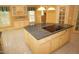 Functional kitchen island with cooktop, drawers, and cabinets, offering convenient cooking space at 1309 Wakefield Farm Rd, Zebulon, NC 27597