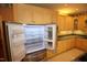 Spacious kitchen with stainless steel refrigerator and matching cabinetry at 1309 Wakefield Farm Rd, Zebulon, NC 27597