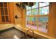 Kitchen sink view overlooking the backyard deck at 1309 Wakefield Farm Rd, Zebulon, NC 27597