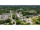 High-angle view displaying the layout of townhomes nestled among mature trees, showcasing the neighborhood's character at 1317 Garner Rd # 101, Raleigh, NC 27610