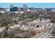 The modern townhomes development with lush landscaping offers an urban living experience with city views at 1317 Garner Rd # 101, Raleigh, NC 27610