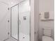 Contemporary bathroom with a sleek glass-enclosed shower and neutral color palette at 1317 Garner Rd # 101, Raleigh, NC 27610