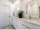 Bright bathroom featuring a double vanity with modern fixtures and ample counter space at 1317 Garner Rd # 101, Raleigh, NC 27610