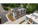 Modern townhome community with rooftop patios, stylish exteriors, and paved driveways at 1317 Garner Rd # 101, Raleigh, NC 27610