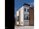 Modern townhome featuring a rooftop deck, a balcony, and an attached single-car garage at 1317 Garner Rd # 101, Raleigh, NC 27610