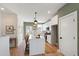 Contemporary kitchen with white island, stainless appliances, and stylish decor at 1317 Garner Rd # 101, Raleigh, NC 27610