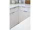 Close up of white cabinets, quartz counters and stainless steel hardware in a kitchen at 1317 Garner Rd # 101, Raleigh, NC 27610