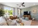 Bright living room with large windows, comfortable seating, and modern decor, creating a welcoming atmosphere at 1317 Garner Rd # 101, Raleigh, NC 27610