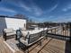 Inviting rooftop deck with comfortable seating and a scenic view of the neighborhood at 1317 Garner Rd # 101, Raleigh, NC 27610