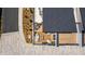 Overhead shot of a rooftop deck with seating and wooden flooring, perfect for outdoor relaxation and entertaining at 1317 Garner Rd # 101, Raleigh, NC 27610