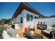 Relaxing rooftop patio with stylish furniture, decorative accents, and a modern design at 1317 Garner Rd # 101, Raleigh, NC 27610
