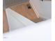 View of a staircase featuring modern design and wood flooring at 1317 Garner Rd # 101, Raleigh, NC 27610