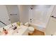 Well-lit bathroom featuring a modern vanity, tub-shower combo, and sleek fixtures at 163 Grace Pond Ave, Benson, NC 27504