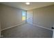 Bedroom featuring a new window with natural light, new carpet, and fresh paint at 163 Grace Pond Ave, Benson, NC 27504