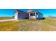 Inviting home with stone accents, lush lawn, and a convenient attached garage at 163 Grace Pond Ave, Benson, NC 27504