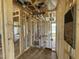Framing of a new construction home with visible electrical and plumbing work, highlighting the building's structural integrity at 163 Grace Pond Ave, Benson, NC 27504