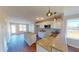 Modern kitchen with granite countertops, stainless steel appliances, and white cabinets at 163 Grace Pond Ave, Benson, NC 27504