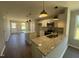 Modern kitchen featuring granite countertops, stainless steel appliances, a large island, and open layout at 163 Grace Pond Ave, Benson, NC 27504