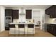 Modern kitchen featuring dark cabinets, a white island, and stainless steel appliances at 1717 Goldfinch Perch Ln, Knightdale, NC 27545