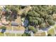 Aerial view of the property showing its location and surrounding trees at 1800 Tee Dee St, Raleigh, NC 27610