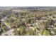 Expansive aerial view of the neighborhood with mature trees and well-maintained homes at 1800 Tee Dee St, Raleigh, NC 27610
