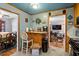 Open kitchen with wood cabinets, modern appliances, and bar seating at 1800 Tee Dee St, Raleigh, NC 27610