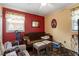 Cozy living room with carpet, and window with curtains for natural light at 1800 Tee Dee St, Raleigh, NC 27610