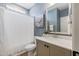 Bathroom featuring single vanity with a shower and tub combo at 1905 Cedar Dam Ln, Wendell, NC 27591