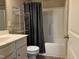 Standard bathroom design, featuring a vanity, toilet, and shower-tub combination at 194 Cornfield Ln, Benson, NC 27504