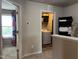 Efficient laundry room with washer, dryer, and convenient storage at 194 Cornfield Ln, Benson, NC 27504
