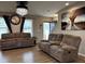 Spacious living room with hardwood floors and comfortable seating at 194 Cornfield Ln, Benson, NC 27504