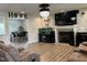 Bright living room with fireplace and modern decor at 194 Cornfield Ln, Benson, NC 27504