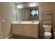 Spacious bathroom featuring a double sink vanity and walk in tub for convenience at 194 Cornfield Ln, Benson, NC 27504