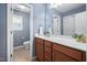 Well-lit bathroom with a large vanity and a separate toilet room at 2001 Lilly Brook St, Fuquay Varina, NC 27526