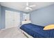 Spare bedroom includes double closet, ceiling fan, and en-suite bathroom access at 2001 Lilly Brook St, Fuquay Varina, NC 27526