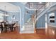 View of the foyer with a staircase and entry to the dining room at 2001 Lilly Brook St, Fuquay Varina, NC 27526