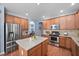 Kitchen with stainless steel appliances and center island at 2001 Lilly Brook St, Fuquay Varina, NC 27526